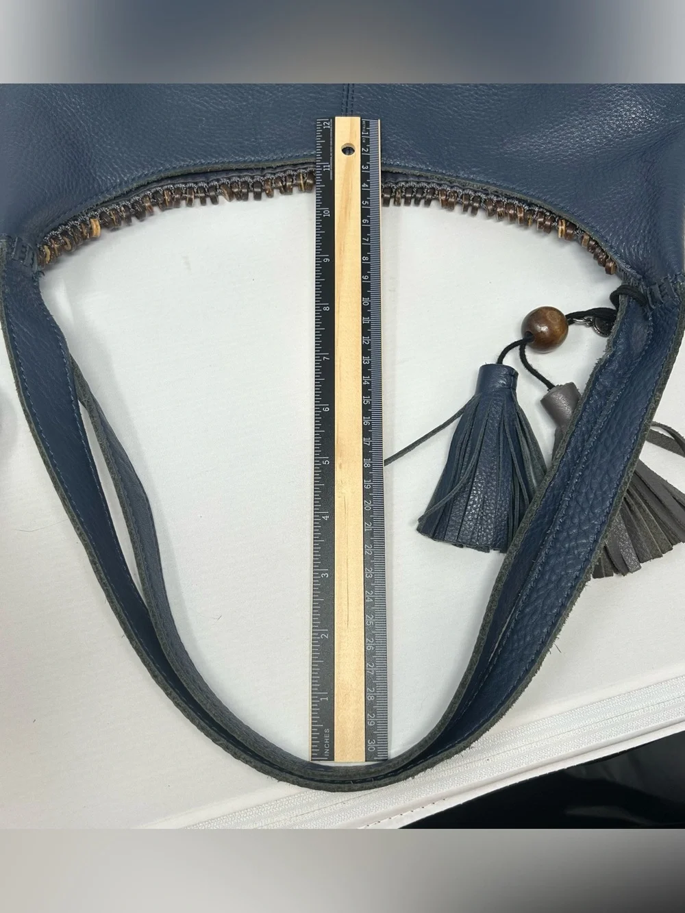 The Sak Boho Leather Hobo Bag slouchy with Beaded Trim and Tassel charm Blue